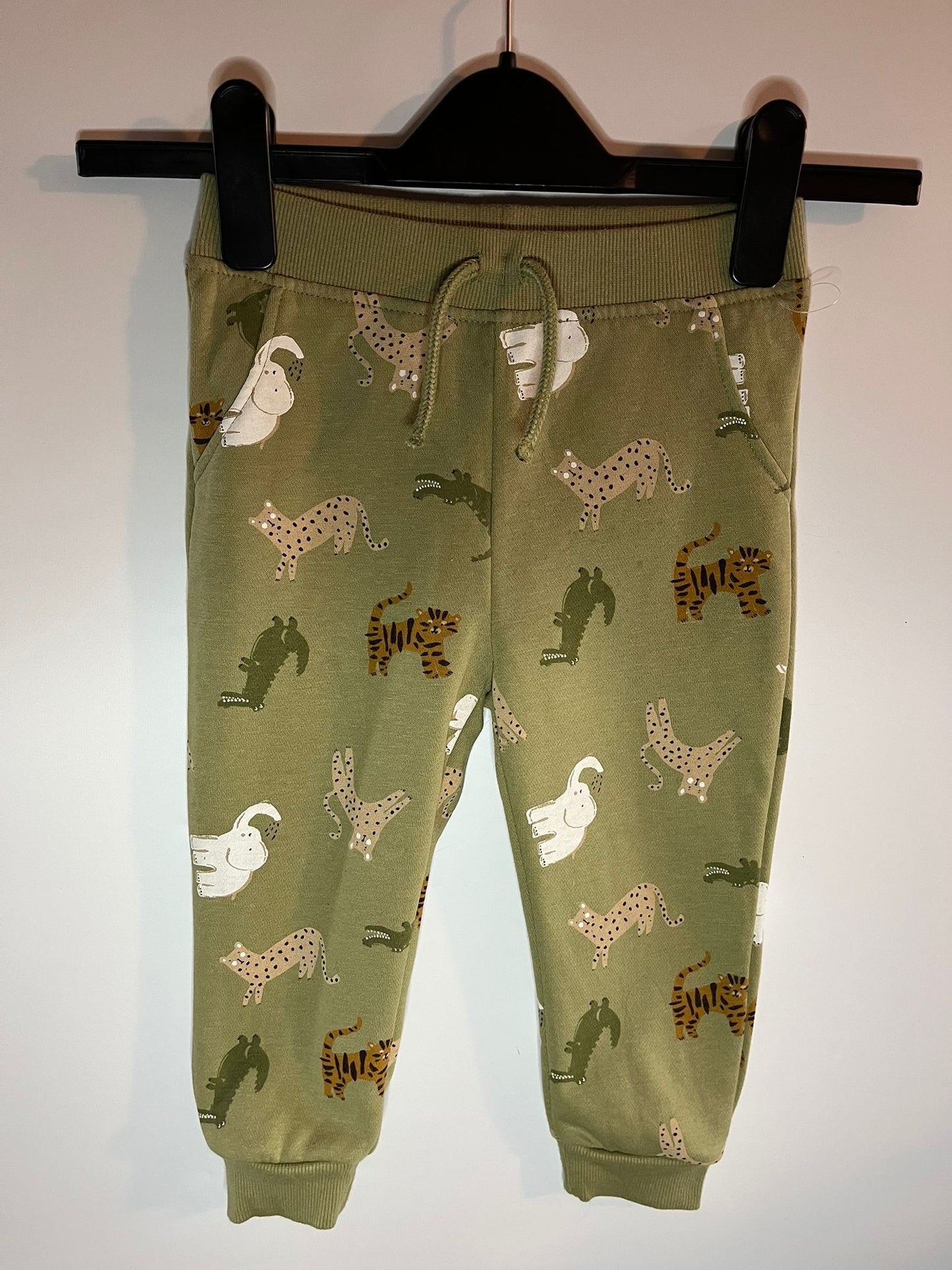 Primark Green animal print joggers, size 18 to 24 months. Preloved Little drums
