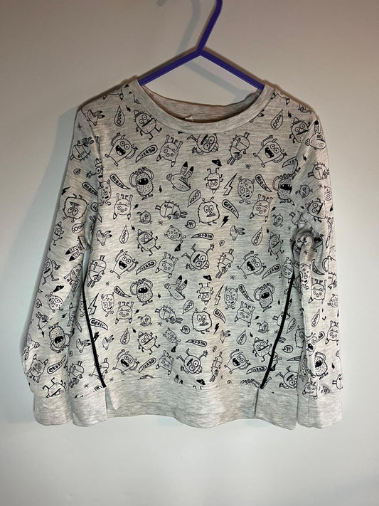 Gray sweatshirt with black monster cartoon character patterns. lily and Dan, preloved little drums
