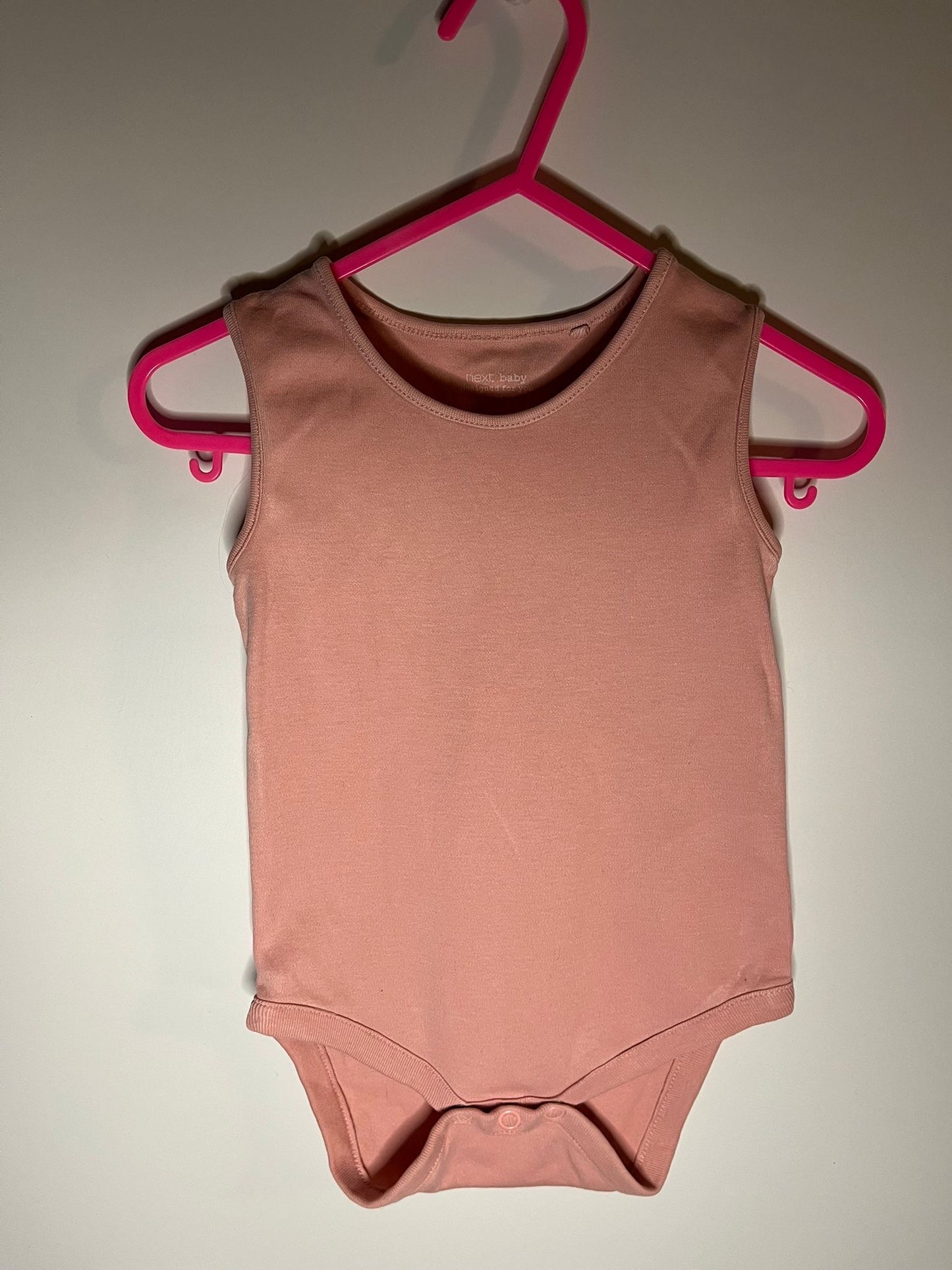 Pink next vest preloved little drums