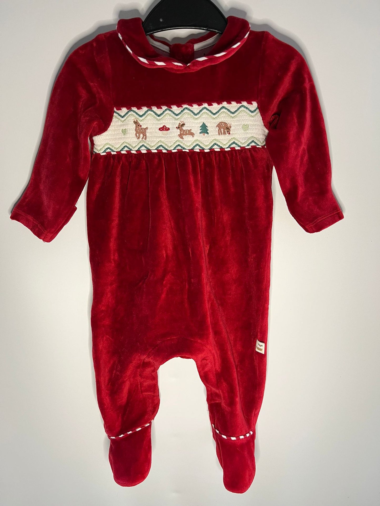 Preloved M&S red Christmas sleepsuit size 3 to 6 months. Little Drums.