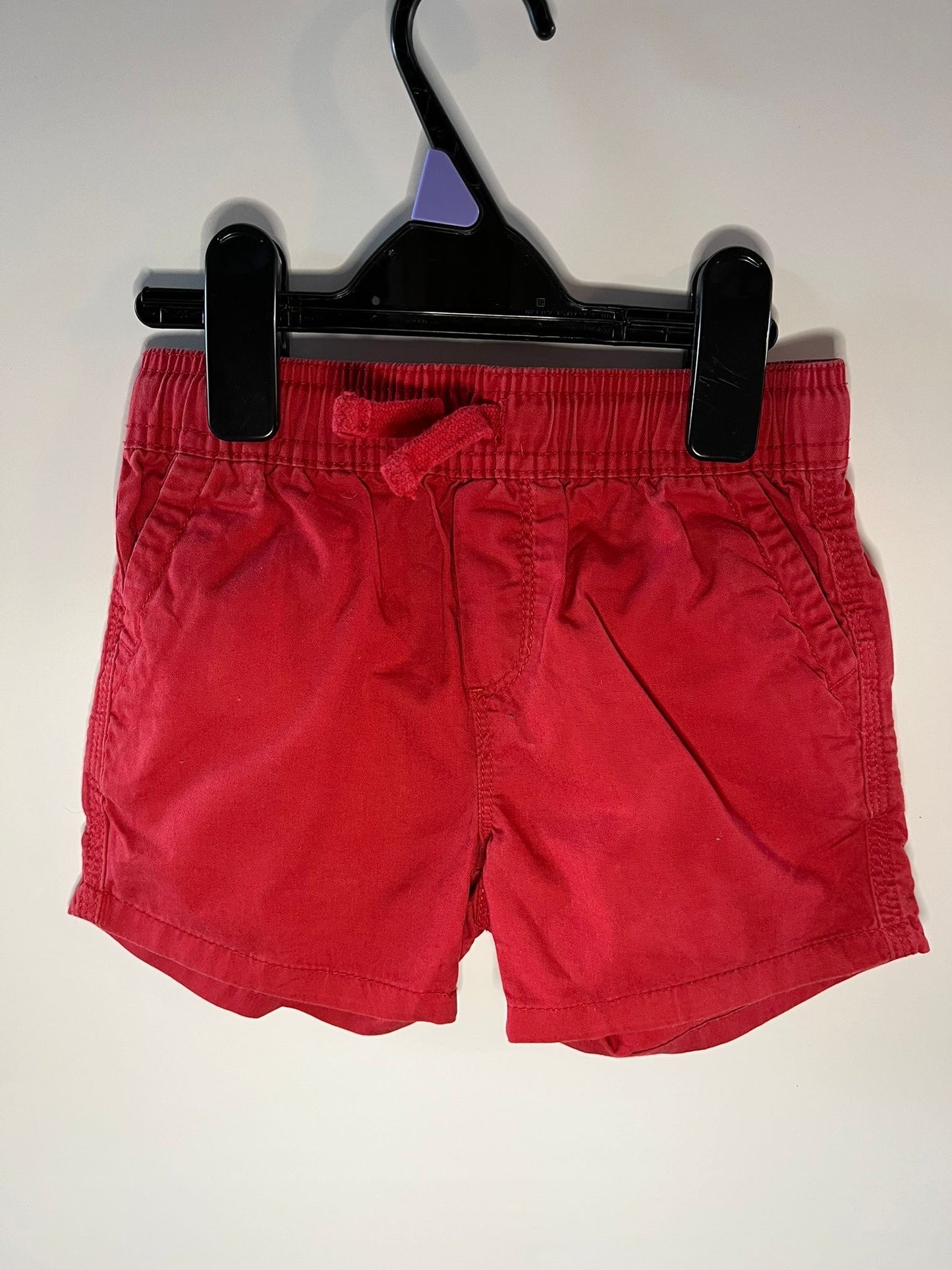 Primark red shorts little drums preloved
