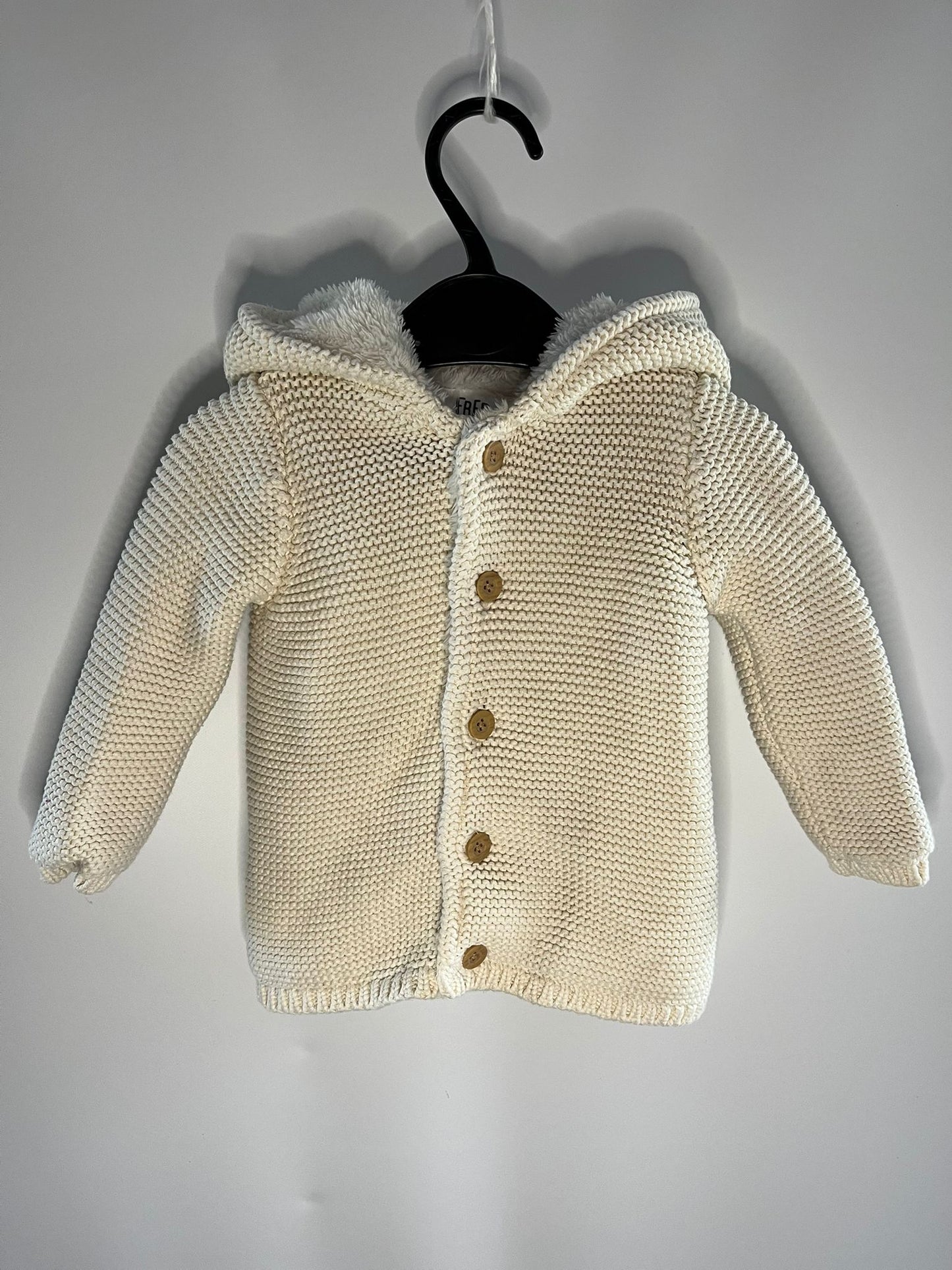 Preloved F&F thick knitted cream cardigan size 6 to 9 months. Little Drums