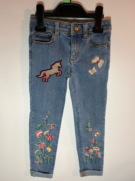 Embroidered jeans with floral designs and a unicorn patch. Monsoon - Little Drums preloved 