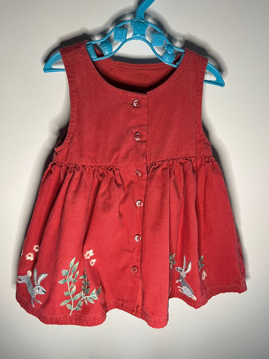 Preloved M&S coral dress with flowers and bunnies size 3 to 6 months. Little Drums
