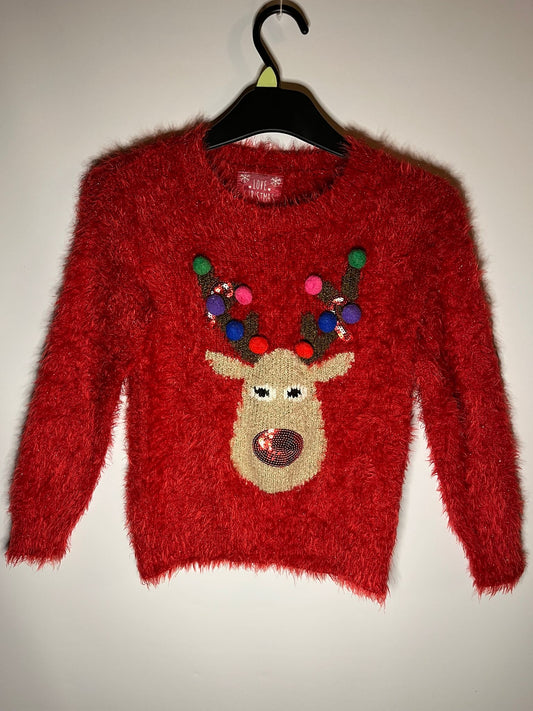 Preloved red fluffy reindeer jumper size 7 to 8 years. Little drums