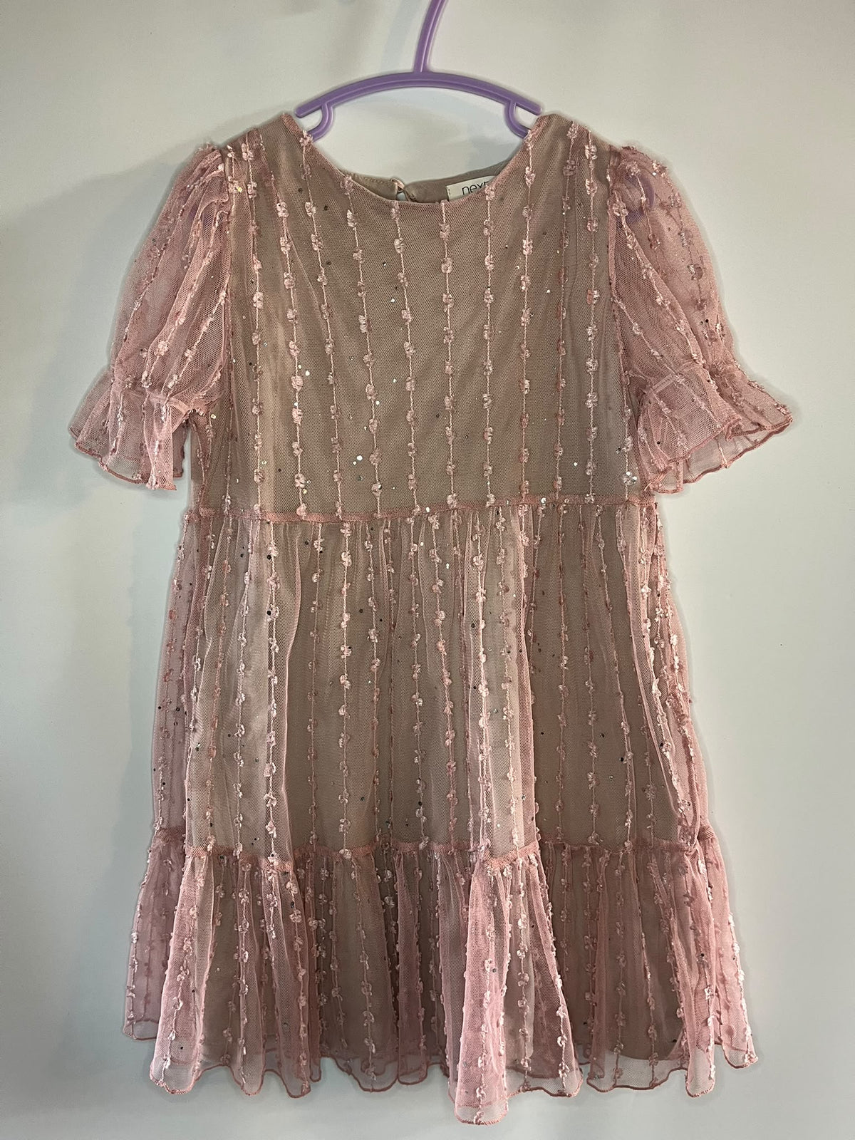 A dusty pink tulle dress with vertical floral embroidery and puff sleeves, next preloved 