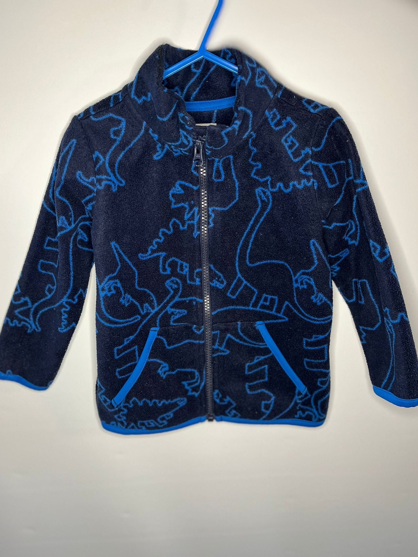 Children's navy fleece with blue dinosaur patterns preloved little drums 