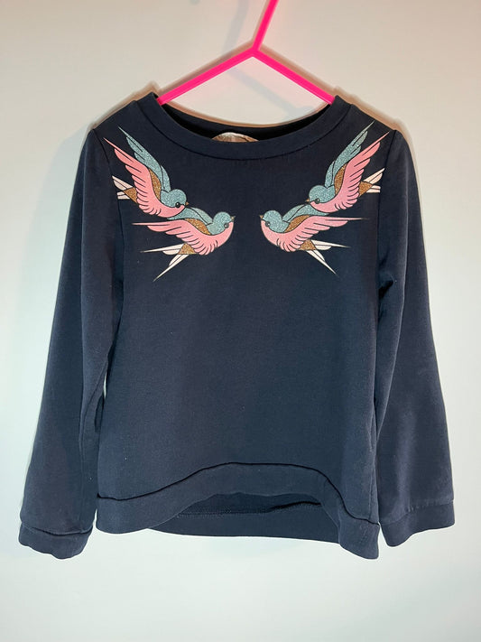 Navy blue sweatshirt with pink and green bird designs. H&M, preloved little drums 