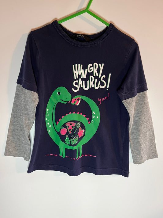 Children's t-shirt with dinosaur graphic and 'Hungry Saurus' text on a hanger.